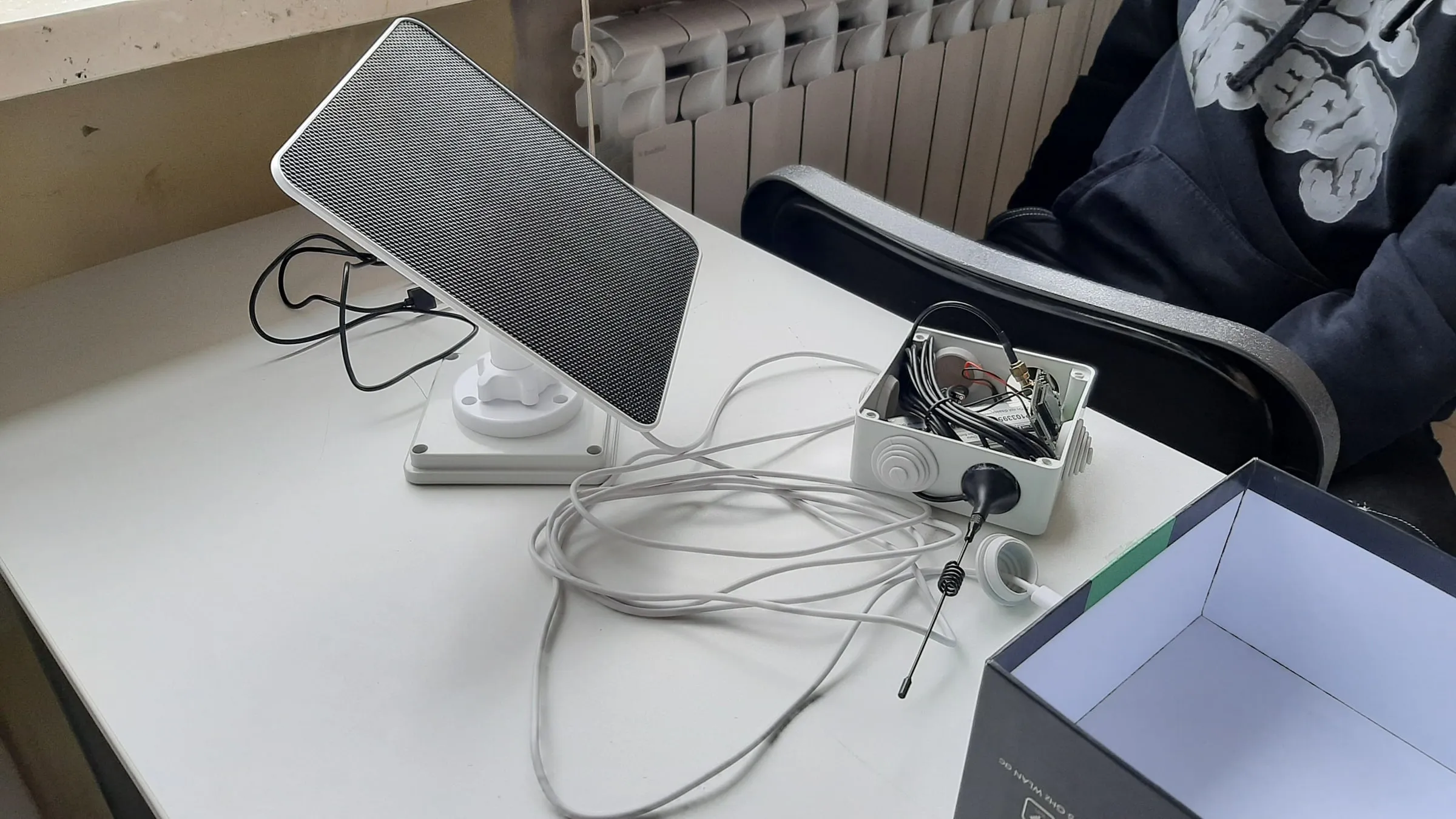 The station on the workbench, with the solar panel on a mount