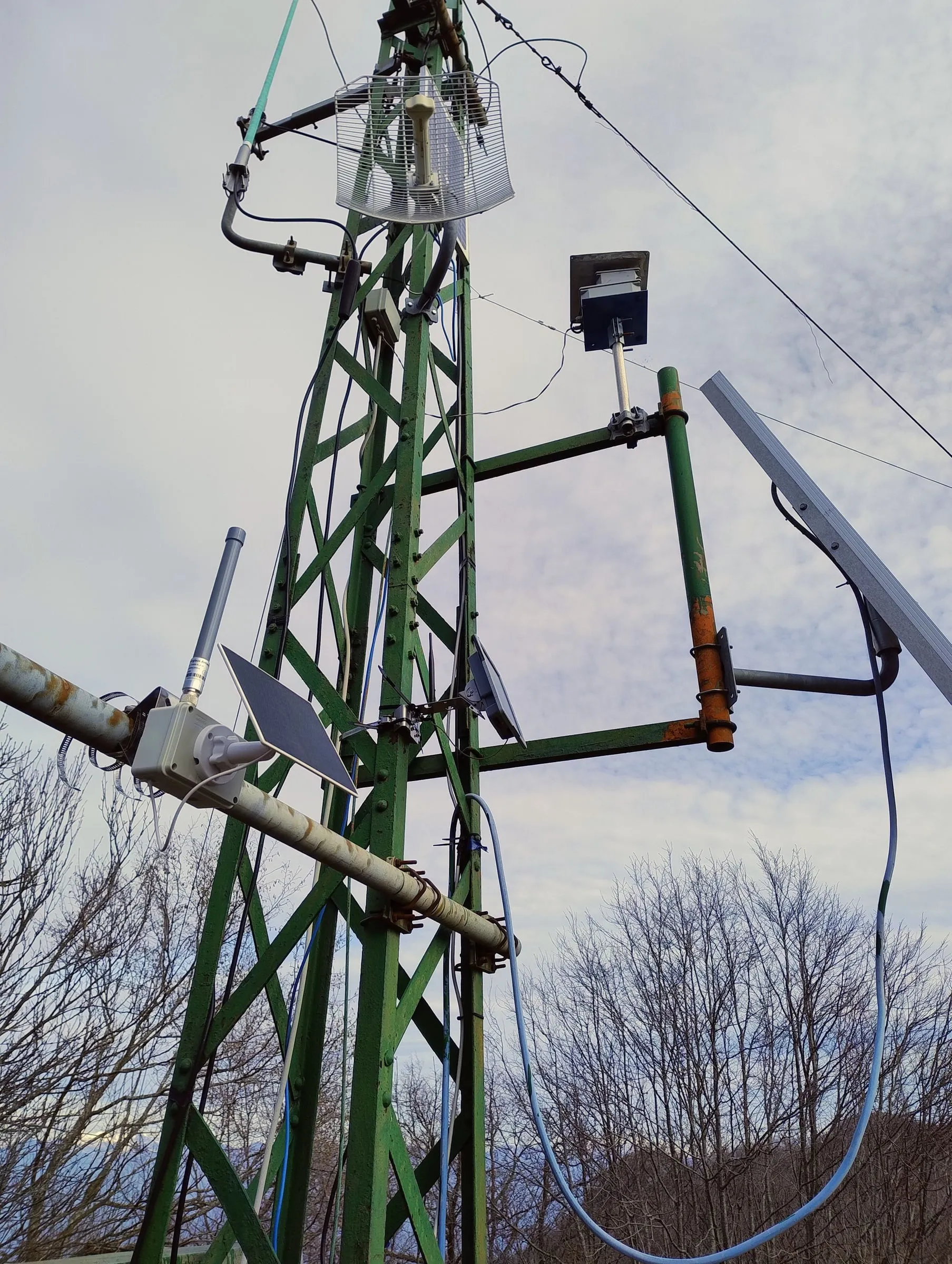 The mast with the two nodes and their solar panels