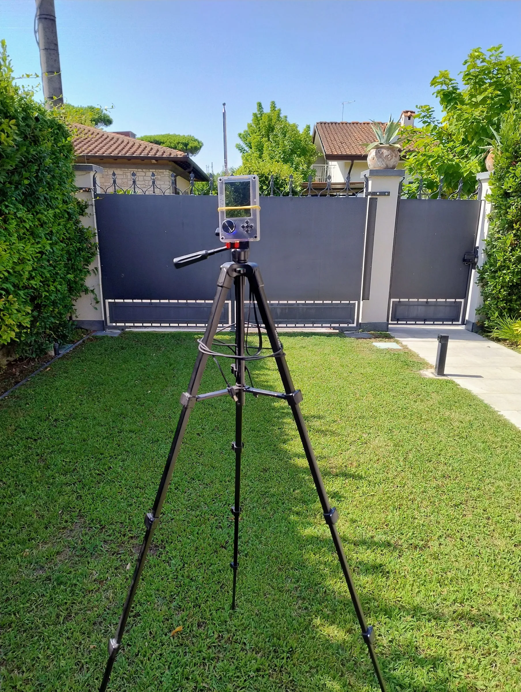The tripod with the transmitter at the end of the garden